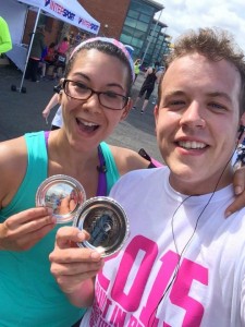 Carolyn Radcliffe and Brad Trecartin show off their medals after completing the 10-kilometre race as part of the Belfast Titanic Half Marathon in July.