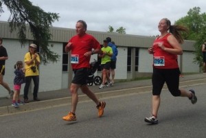 Elspeth and Donald Lemon run together in the St. Andrew's Father's Day Road Race in  2014
