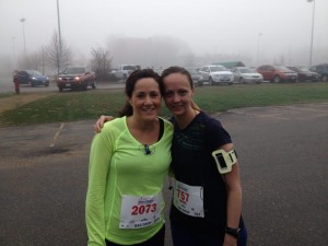 Carol Lynn Landry, left, poses for a photo with her sister Renee Landry at the 2014 Fredericton Marathon.