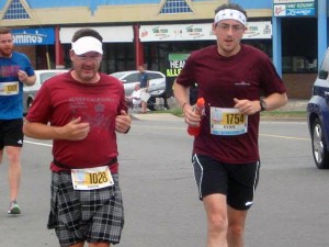 Mark Clinton, left, and Evan Hachey complete the half marathon on Sunday.