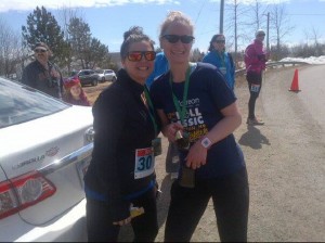 Erica MacMillan and Stacy Sproule pose for a photo after finishing the 2015 Lorneville Loop.